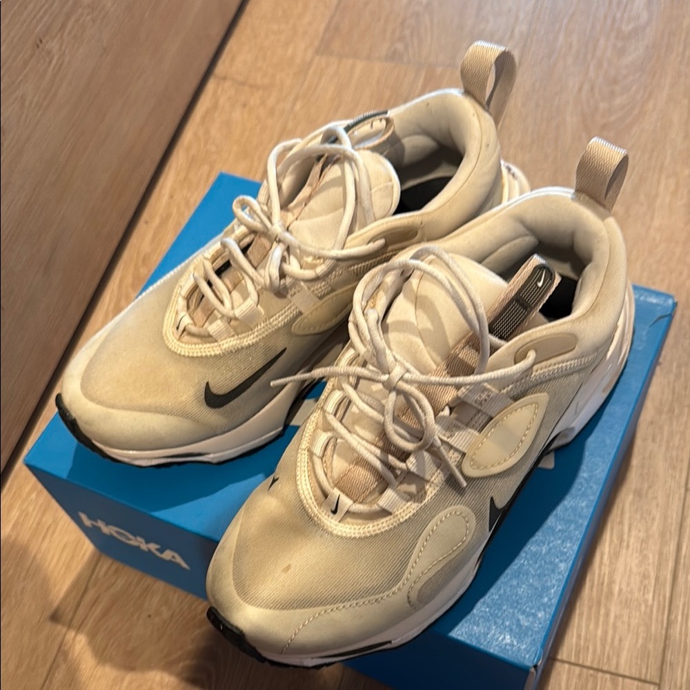 Nike Cream Athletic Sneakers with Modern Design and Cushioned Support
